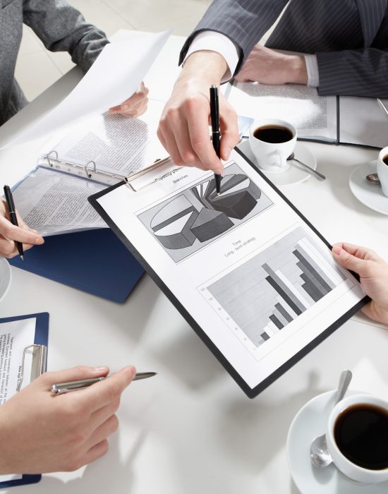 Image of human hands during discussion of business plans